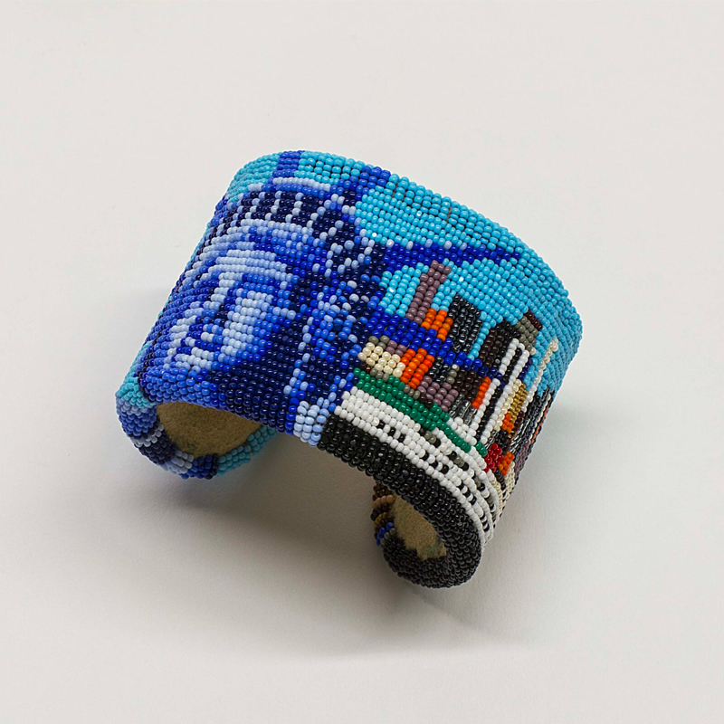 A beaded bracelet with the Statue of Liberty on it.
