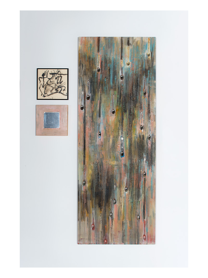 An abstract painting hanging on a wall.