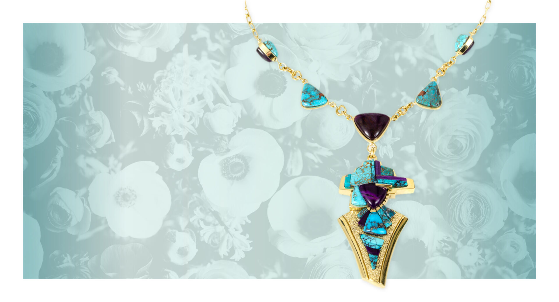 A necklace with turquoise and purple stones on a floral background.