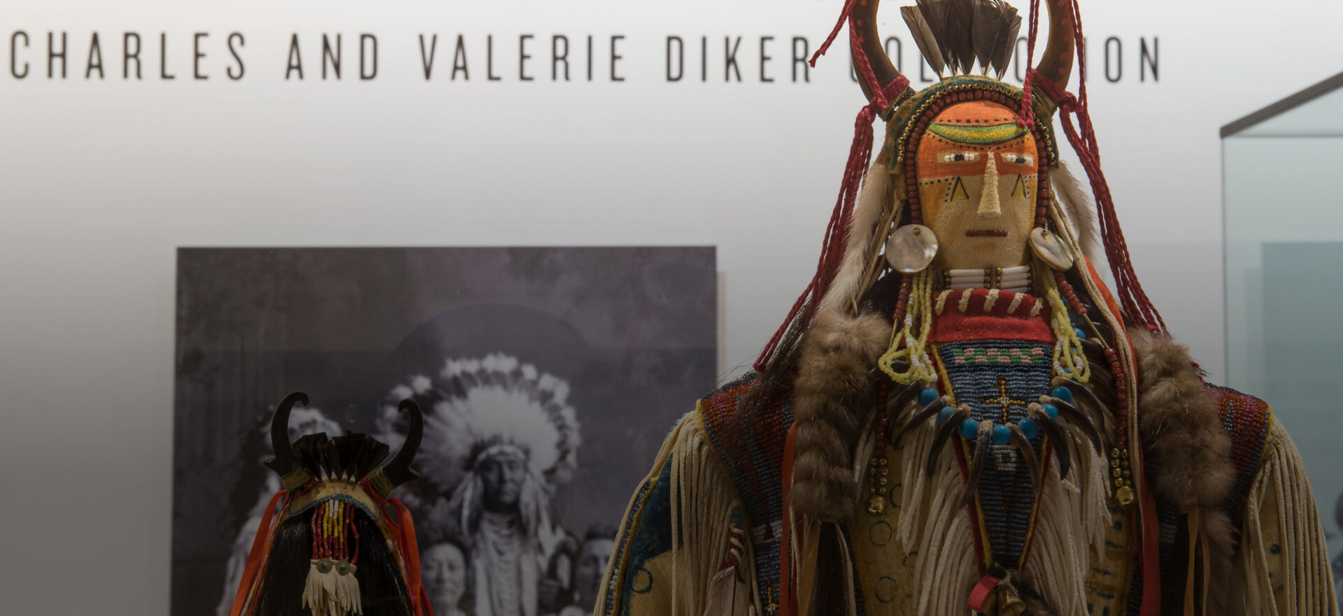 Contemporary Plains Indian Dolls on display in a gallery.