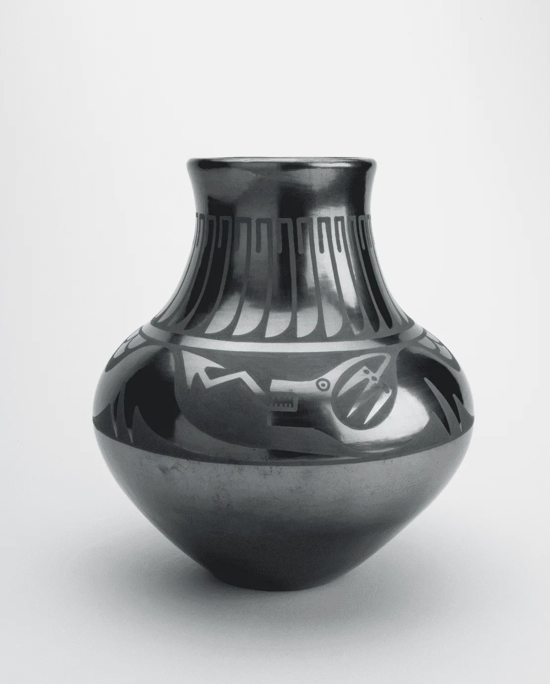 A black vase on a white background.