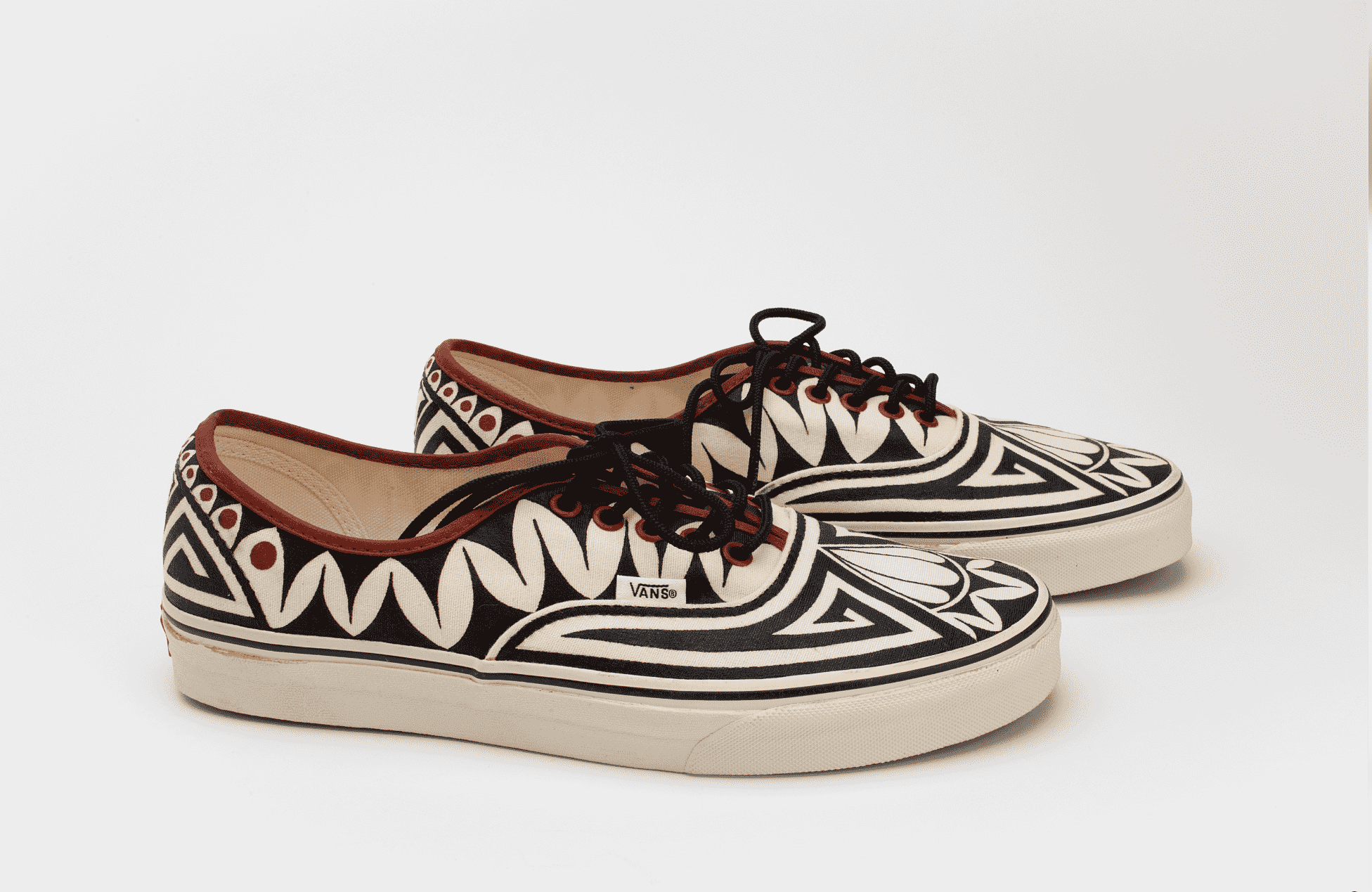A pair of shoes with a pattern on it.