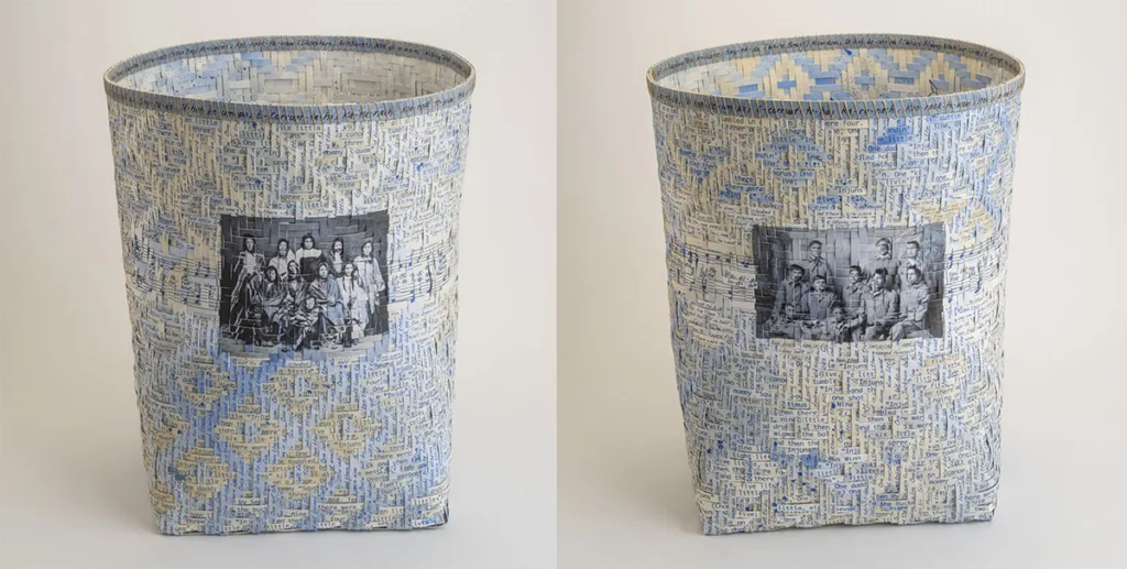 A woven cylindrical basket in light blue and beige patterns featuring black-and-white photos of groups of people on opposite sides.