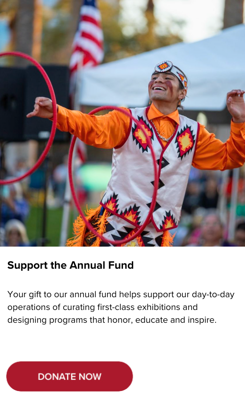 A person dressed in traditional attire performs a dance in front of a crowd. The text encourages donations to support annual fund operations and programs. A "Donate Now" button is prominently displayed.