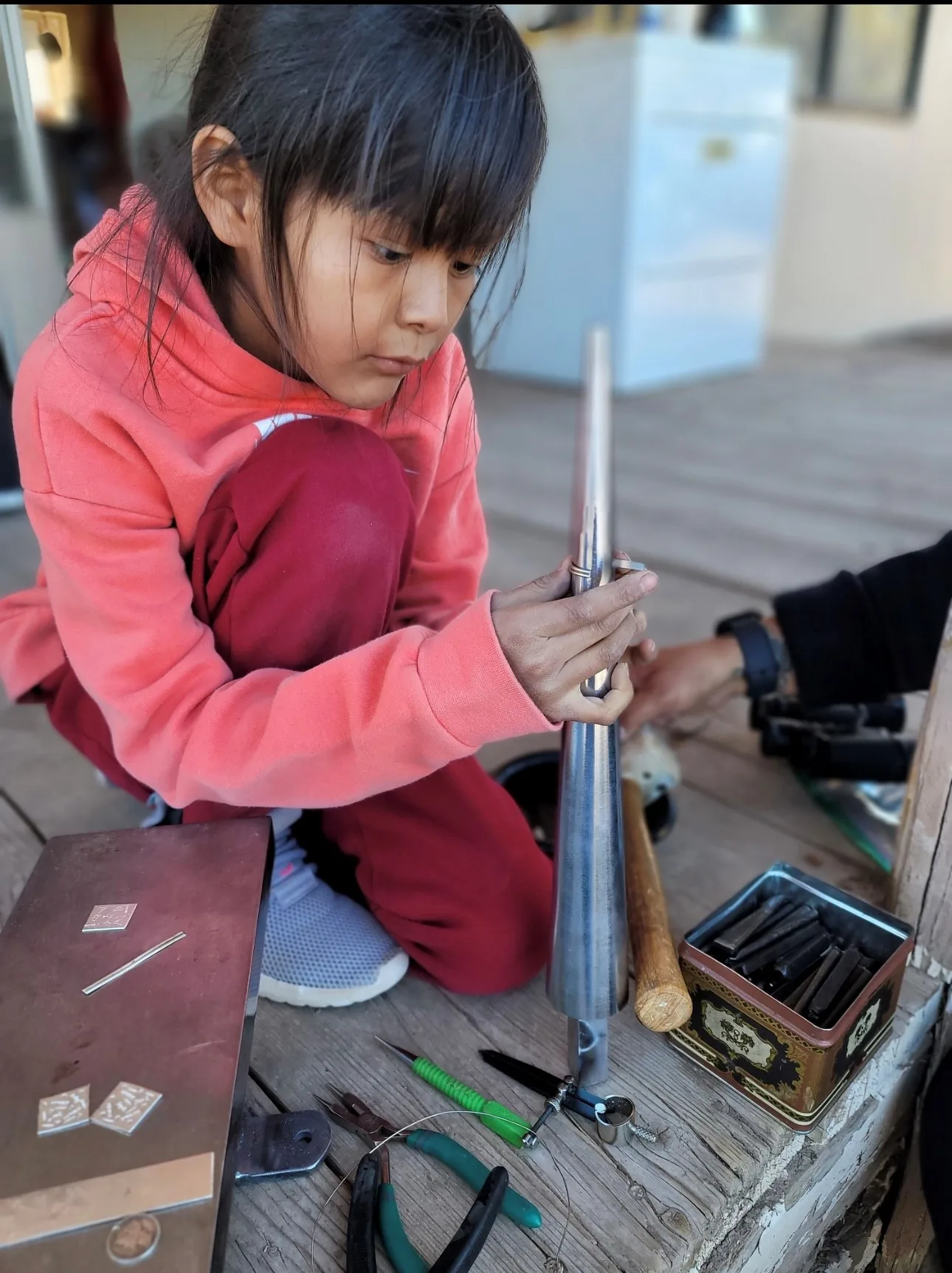 Noelle Nelson, niece of Jay C. McCray, is on her way to becoming the 7th generation of silversmiths in the McCray family. Photo courtesy of Jay C. McCray.